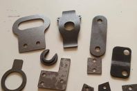 精密沖壓件產生時出現翻料、扭曲的原因及解決方法